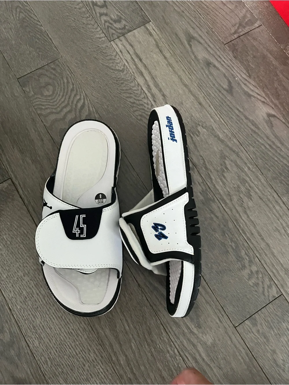 Jordan mens White and Black Slide Sandals with Blue Jumpman mix match mens 8